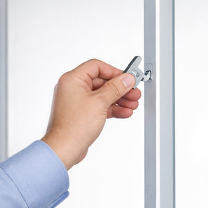 Hand using a support clip for Fermostock 5711 with a white background