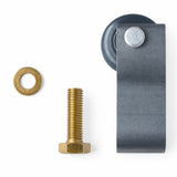 Metal sliding door roller with washer and bolt on a white background