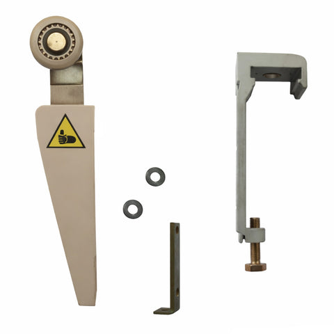Mechanical components including a large blade, smaller parts, and a warning label on a white background.