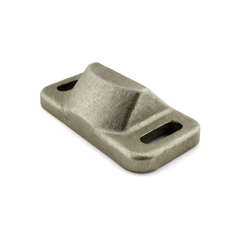 Metallic object with a geometric design on a white background