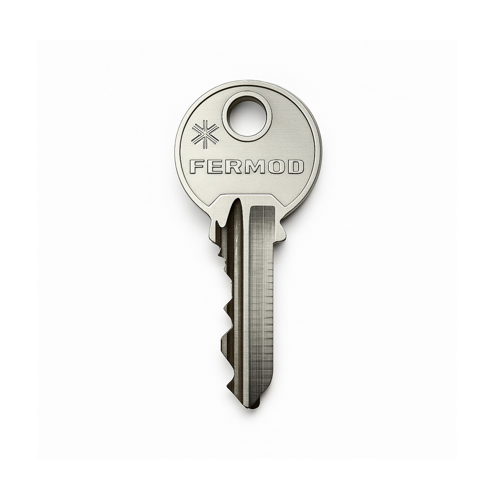 Metal key with 'FERMOD' branding on a white background