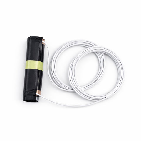 Black coiled Thermal Dynamics Foil Threshold Heater with white tails - Absolute Coldroom